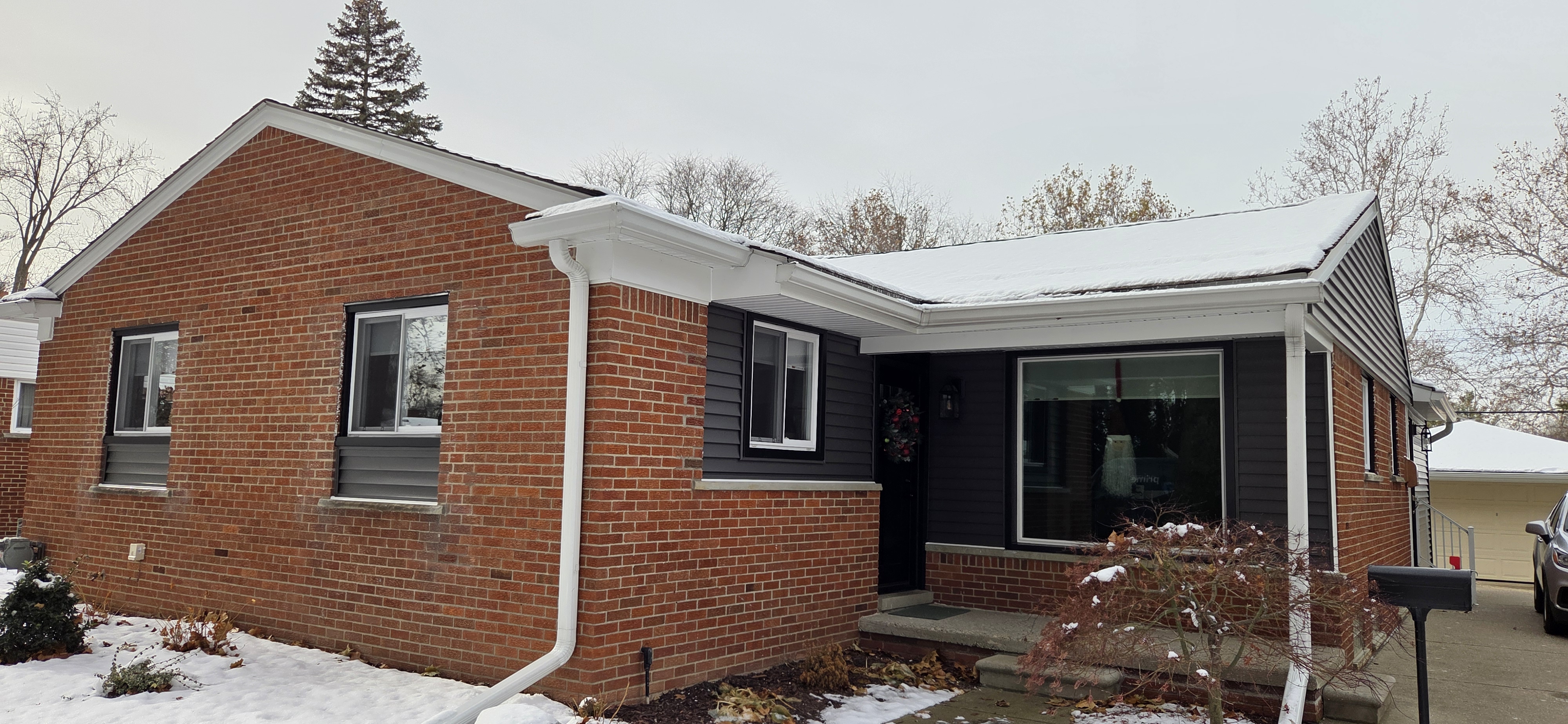 Finished siding home in Livonia